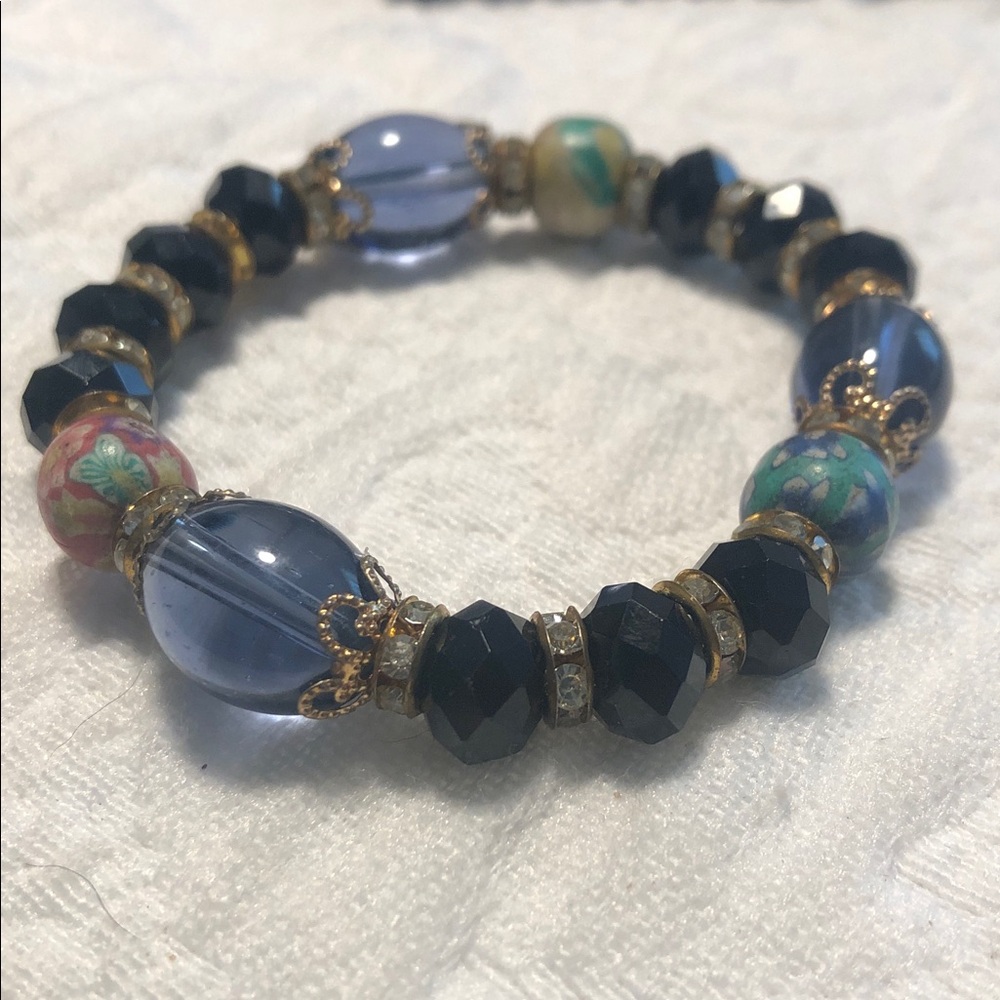 Handcrafted Blue and Black Beaded Stretch Bracelet with Floral Accent